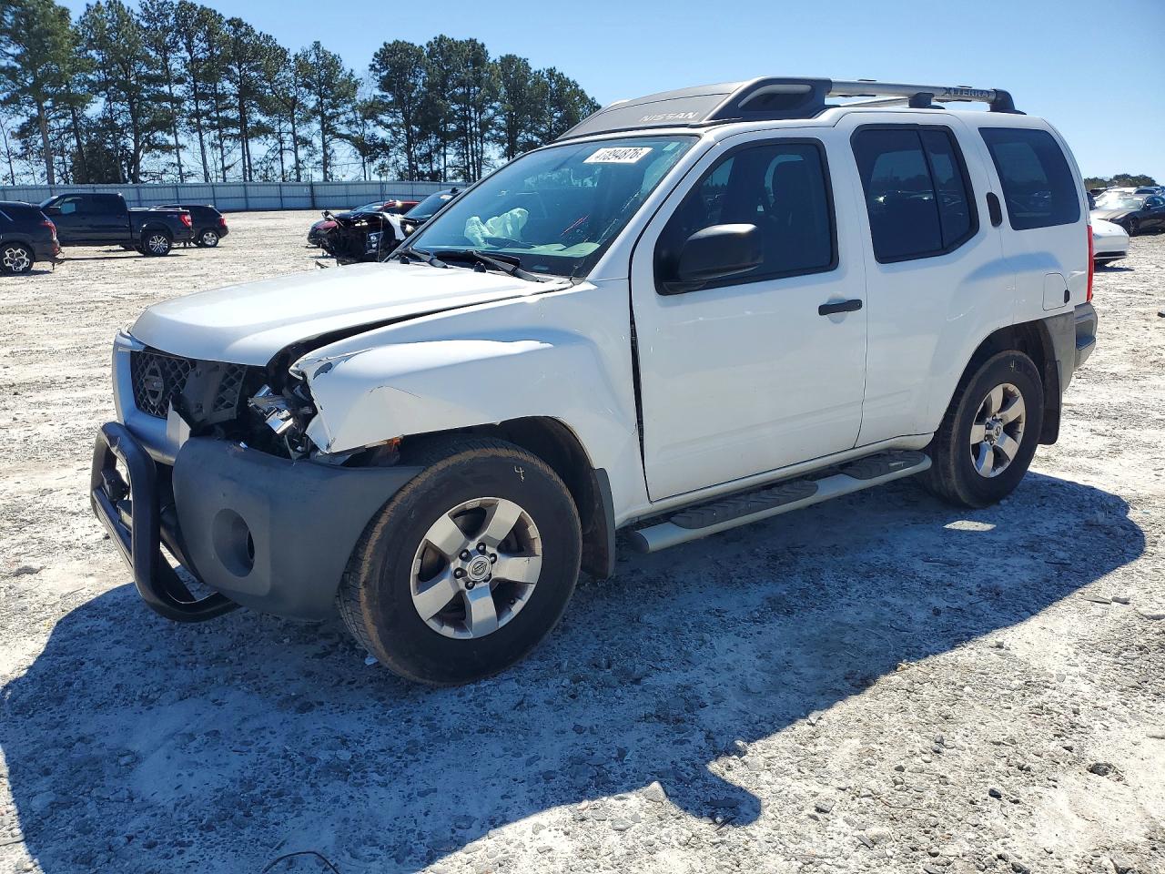 2010 Nissan Xterra VIN 5N1AN0NU5AC517470 photo 1