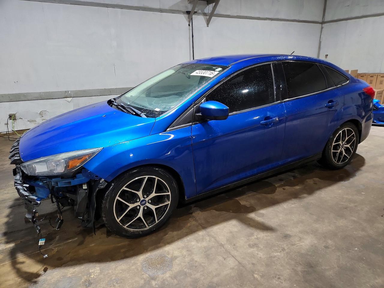 2018 Ford Focus VIN 1FADP3F2XJL310993 photo 1
