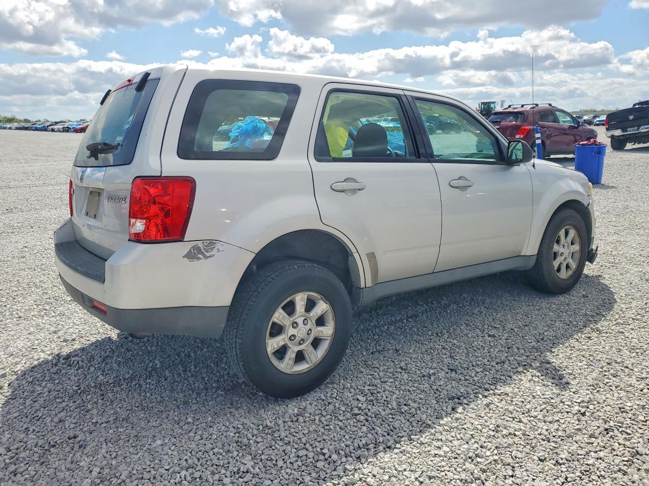 2009 Mazda Tribute VIN 4F2CZ02769KM09344 photo 3