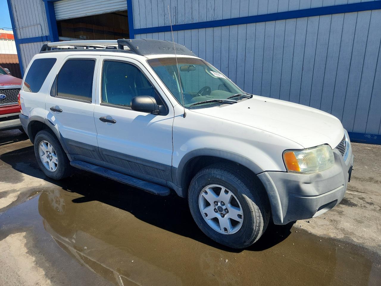 2004 Ford Escape VIN 1FMYU031X4KA98214 photo 4
