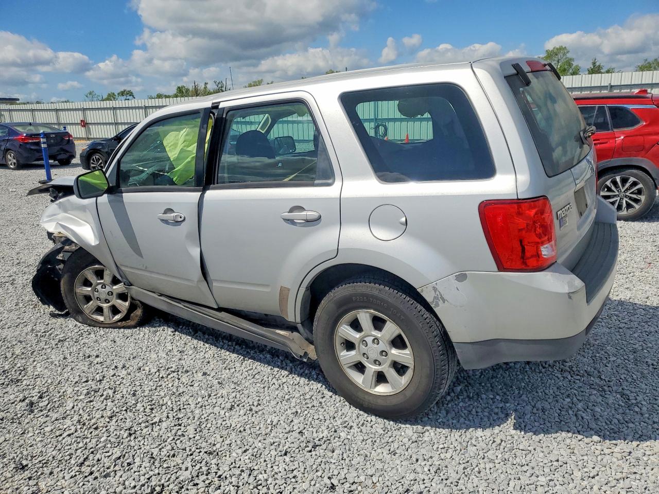 2009 Mazda Tribute VIN 4F2CZ02769KM09344 photo 2