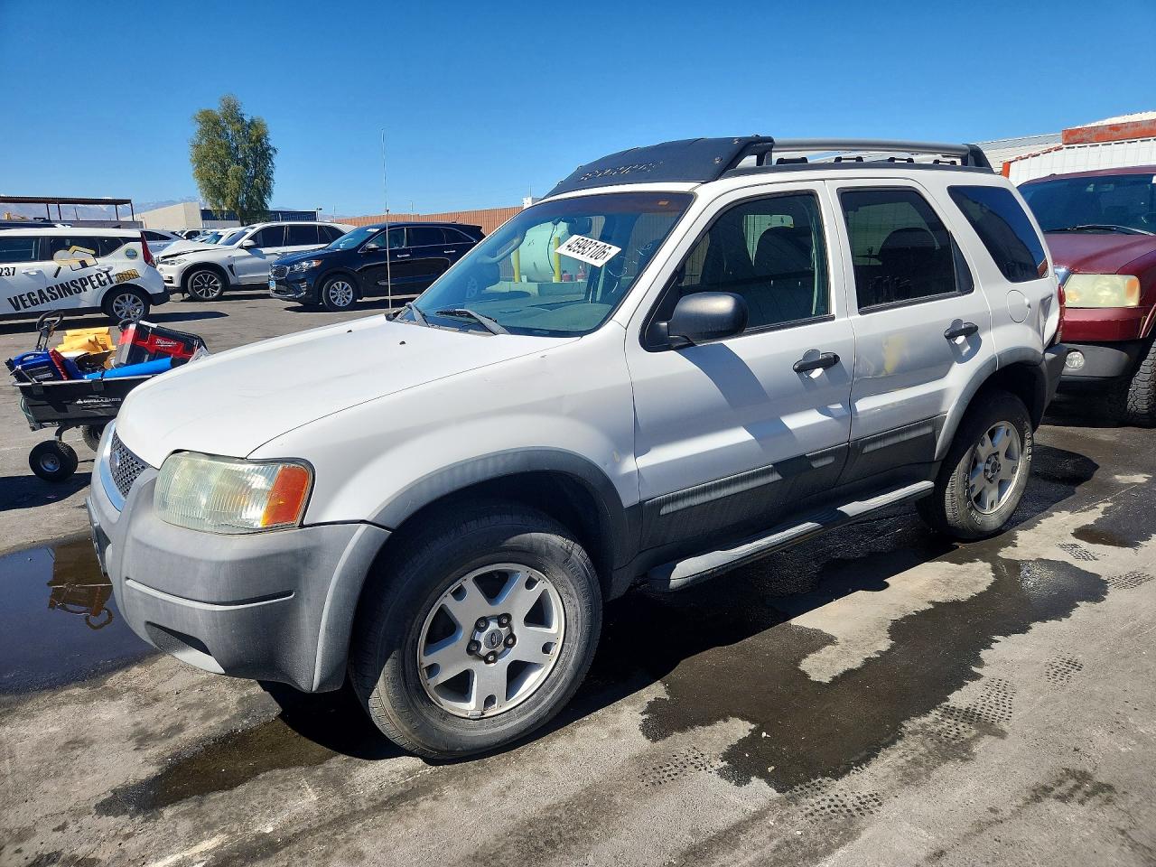 2004 Ford Escape VIN 1FMYU031X4KA98214 photo 1