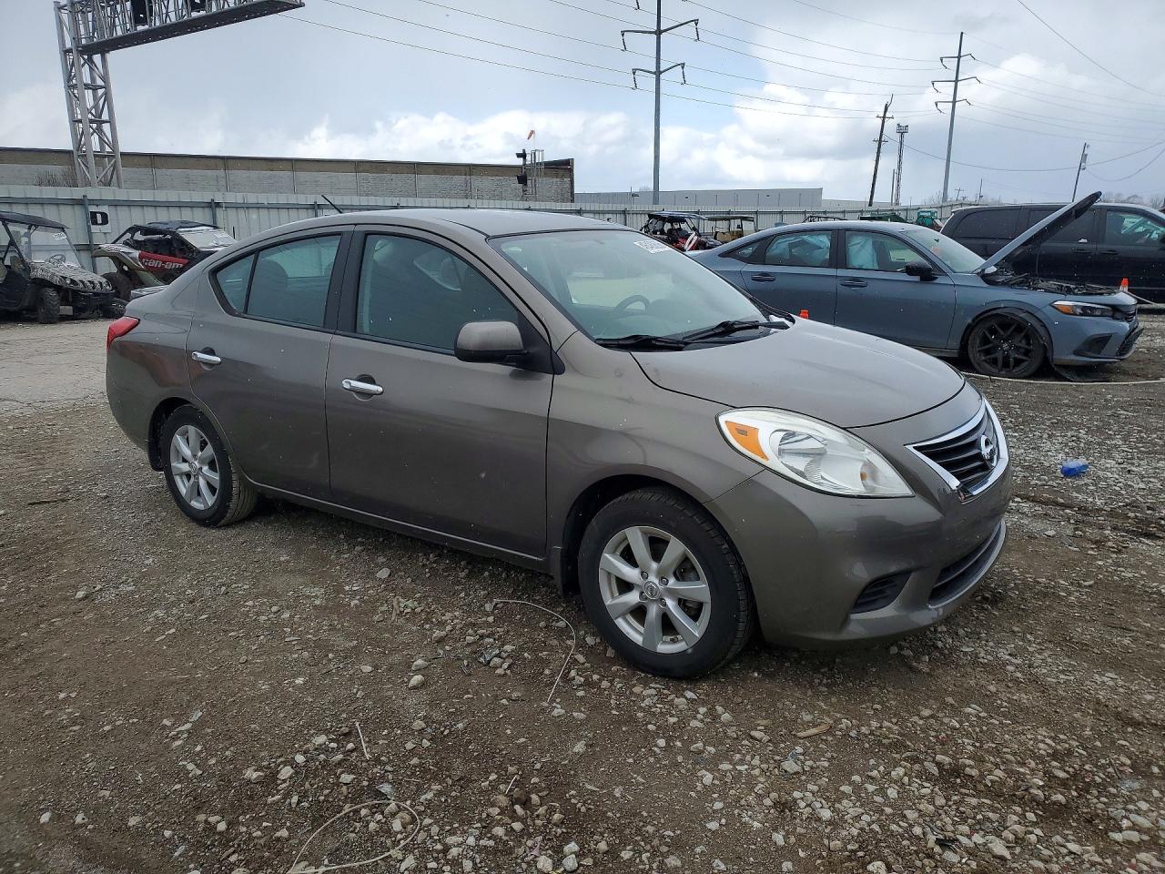 2014 NISS Versa VIN 3N1CN7AP0EL826945 photo 4