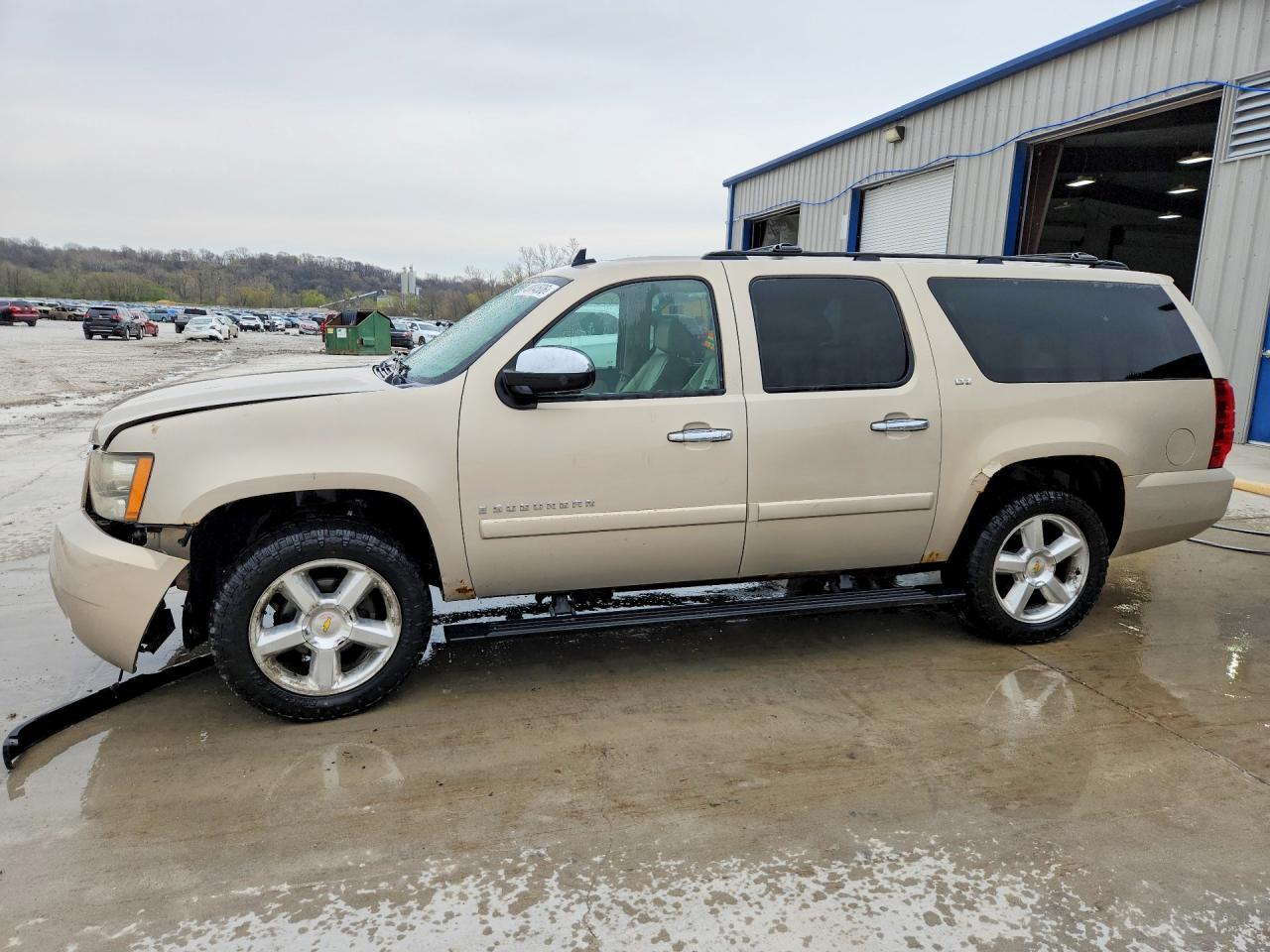 2008 Chevrolet Suburban VIN 1GNFK16328J110136 photo 1