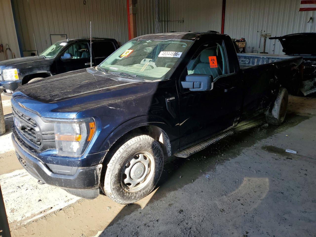 2023 Ford F150 VIN 1FTMF1EP3PKD13263 photo 1
