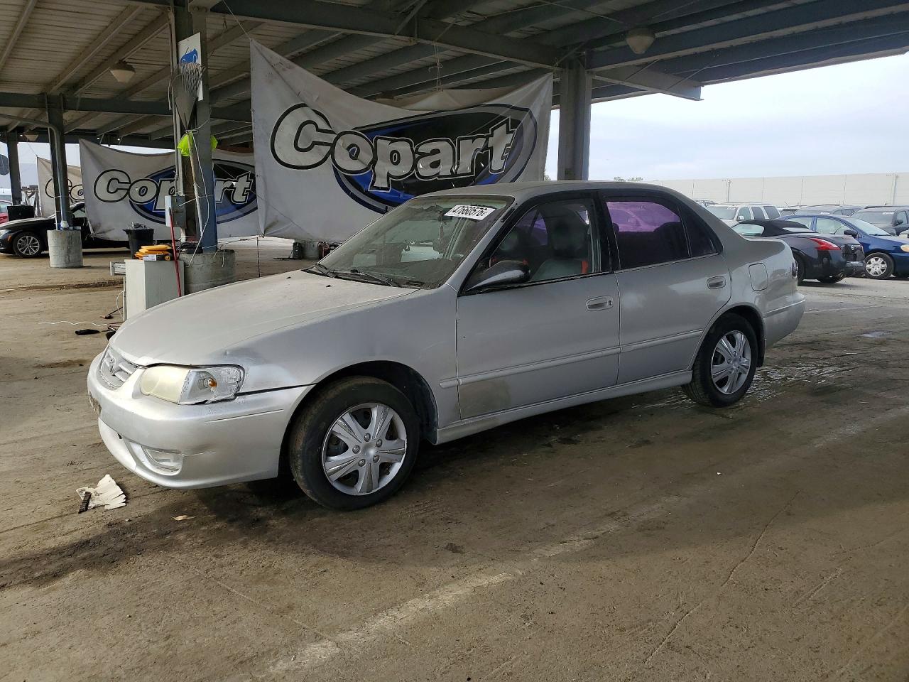 2002 Toyota Corolla VIN 1NXBR12E72Z627752 photo 1