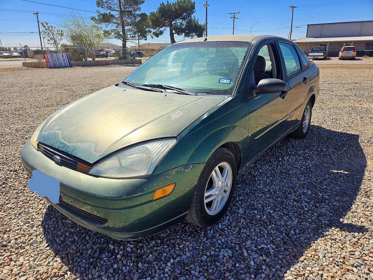 2000 Ford Focus VIN 1FAFP3433YW219500 photo 2