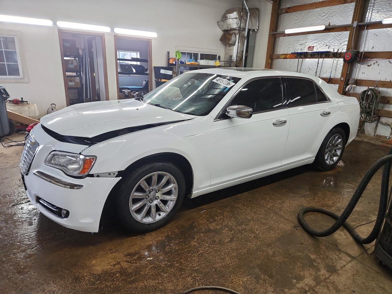 2011 Chrysler 300 VIN 2C3CA5CG6BH559345 photo 1