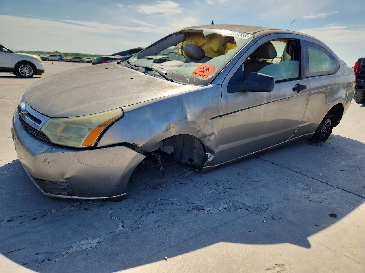 2008 Ford Focus VIN 1FAHP32N98W211060 photo 1