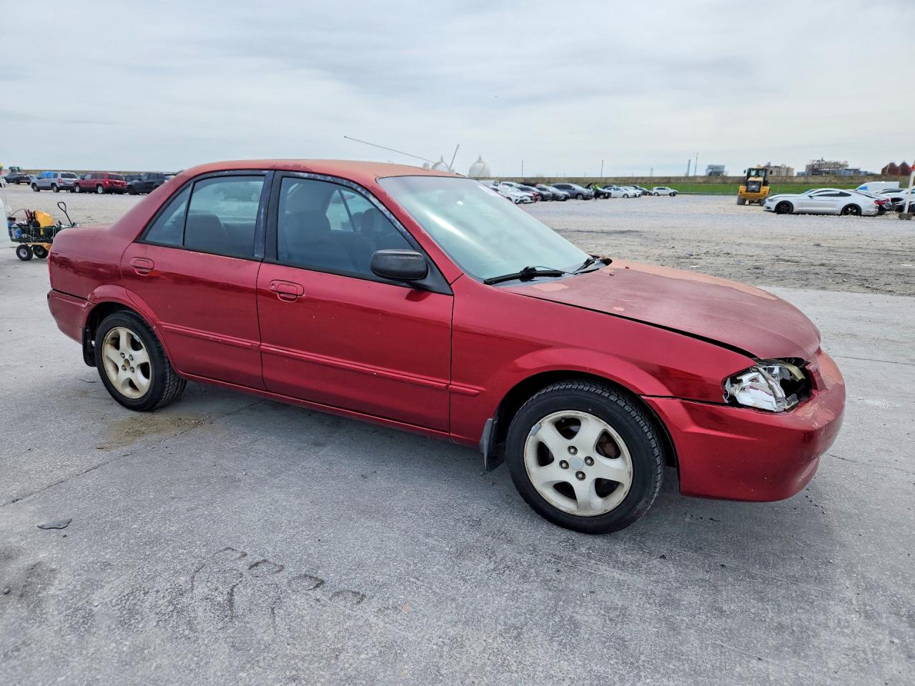 1999 Mazda Protege VIN JM1BJ2216X0183504 photo 4