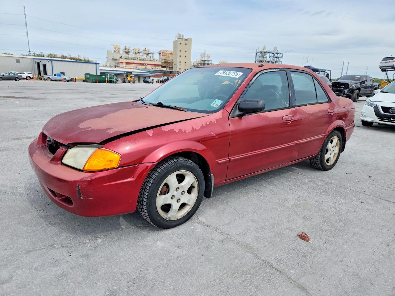 1999 Mazda Protege VIN JM1BJ2216X0183504 photo 1