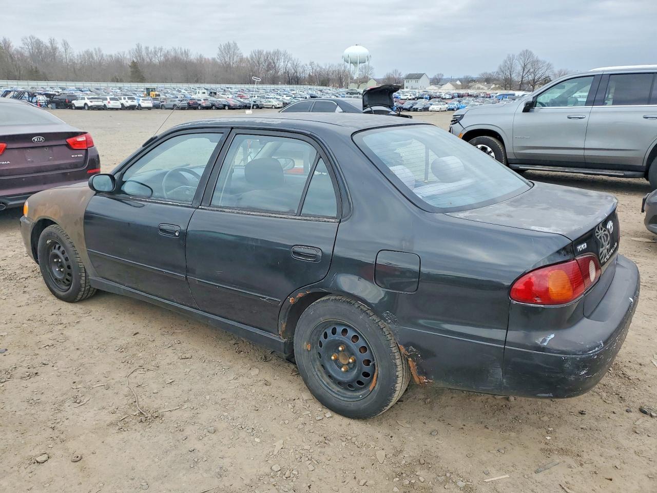2001 Toyota Corolla VIN 1NXBR12E11Z490998 photo 2