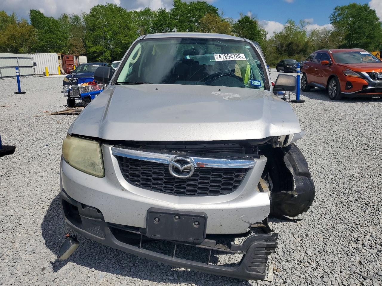 2009 Mazda Tribute VIN 4F2CZ02769KM09344 photo 5