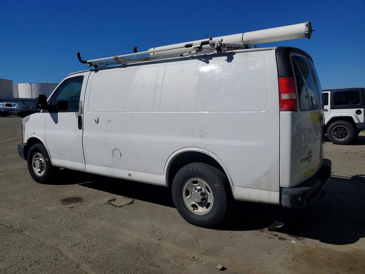 2012 CHEV Express VIN 1GCWGFCB9C1117807 photo 2