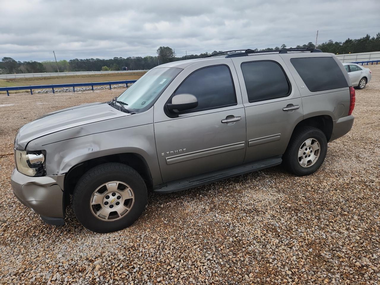 2009 Chevrolet Tahoe VIN 1GNFK230X9R268582 photo 1