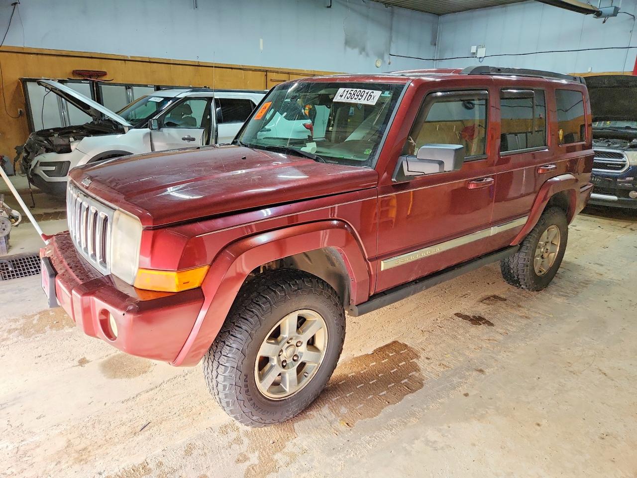 2008 Jeep Commander VIN 1J8HH58208C111519 photo 1