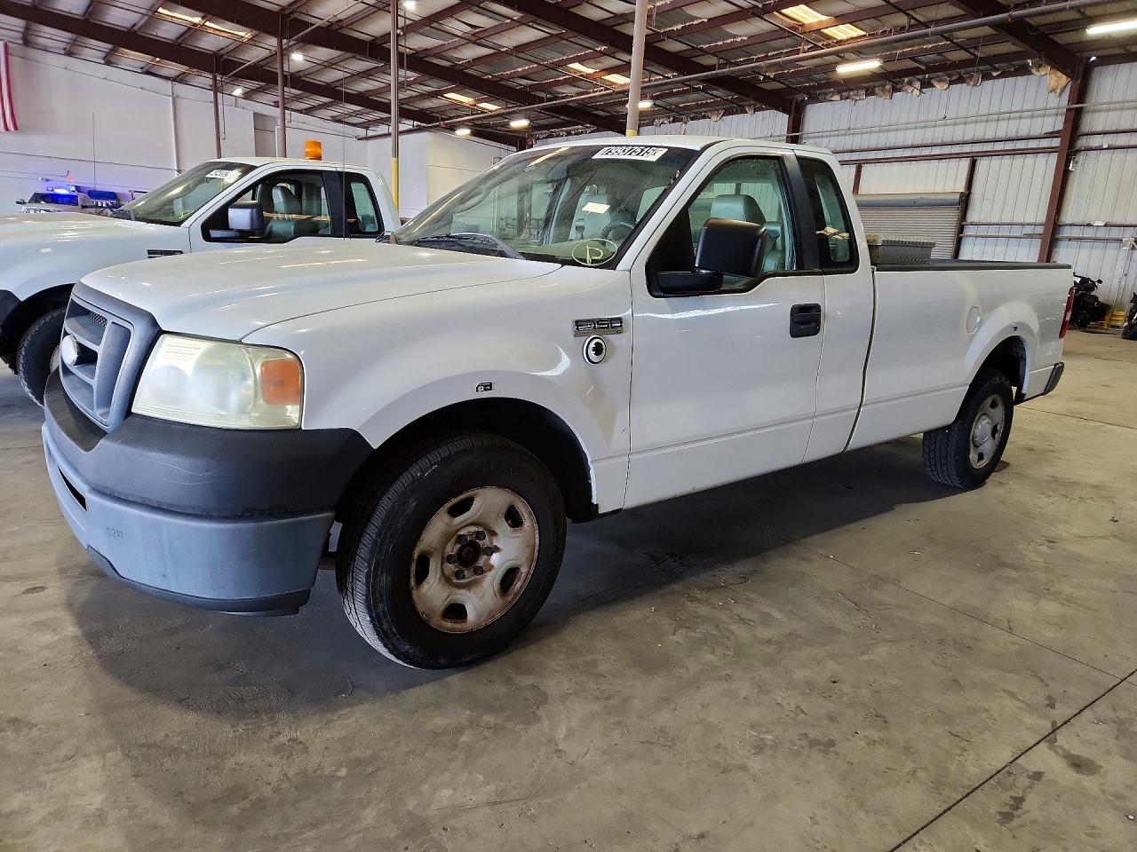2008 Ford F150 VIN 1FTRF12278KC11111 photo 1