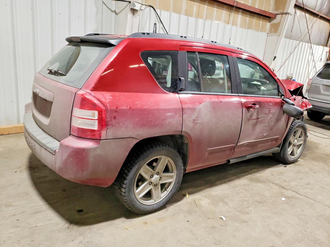 2010 Jeep Compass VIN 1J4NF4FB9AD601674 photo 3