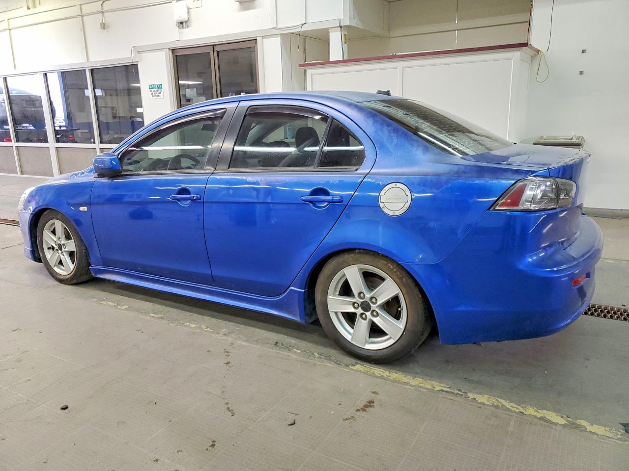 2009 Mitsubishi Lancer VIN JA3AU26U89U003392 photo 2