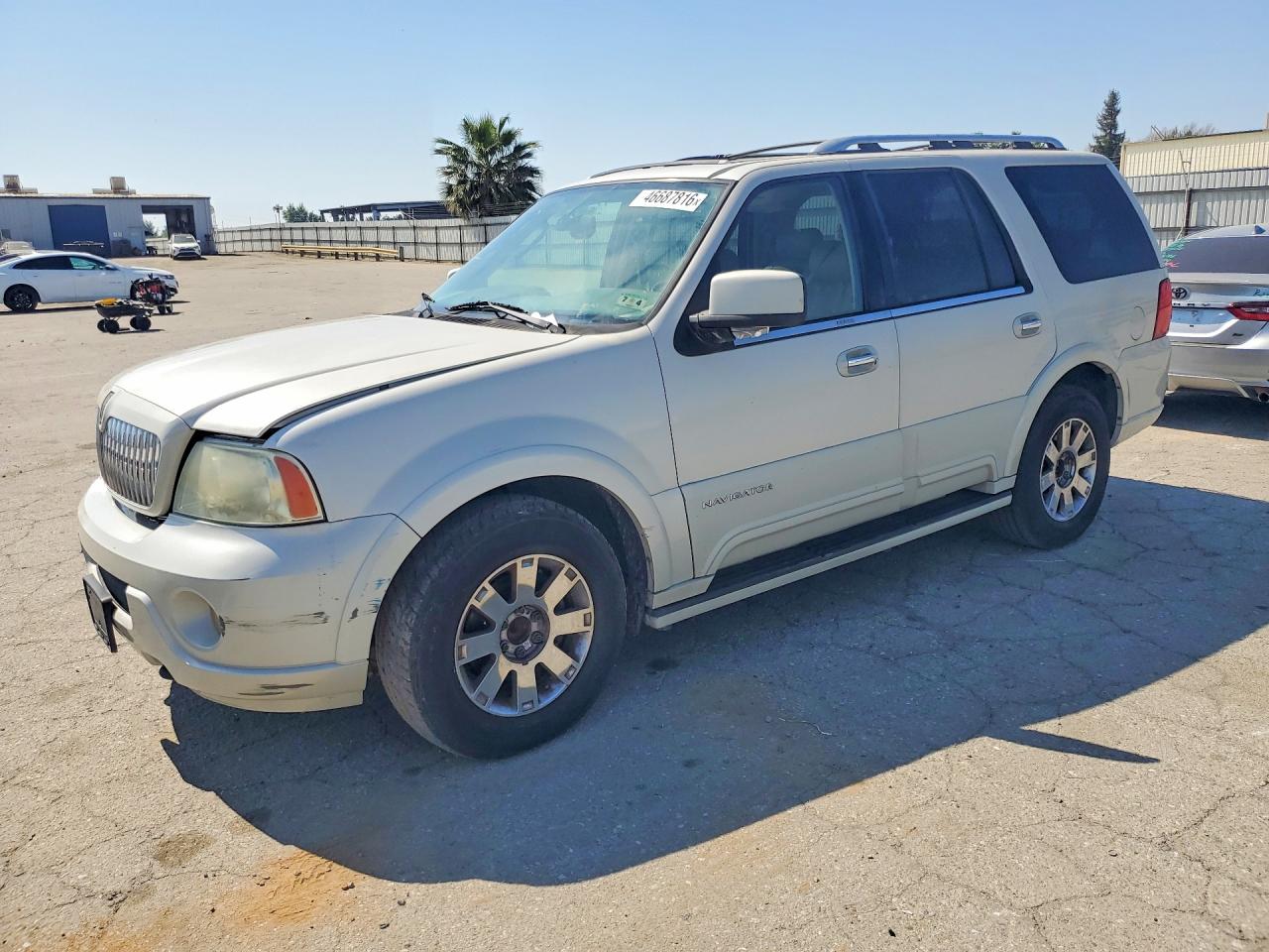 2004 LINCOLN Navigator VIN 5LMFU27R34LJ37915 photo 1