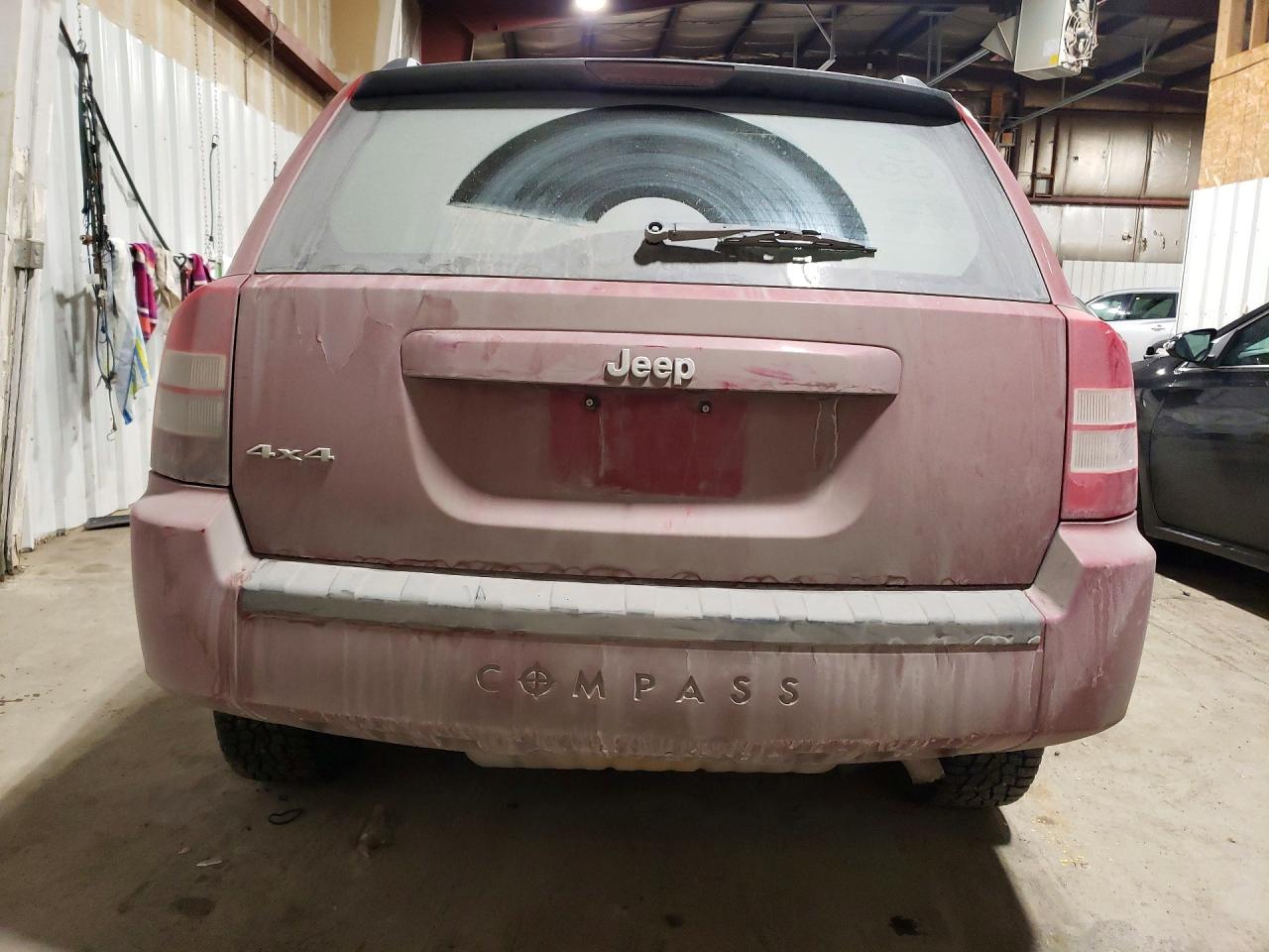 2010 Jeep Compass VIN 1J4NF4FB9AD601674 photo 6