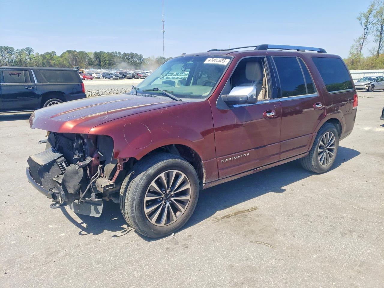 2015 Lincoln Navigator VIN 5LMJJ2HT0FEJ09588 photo 1