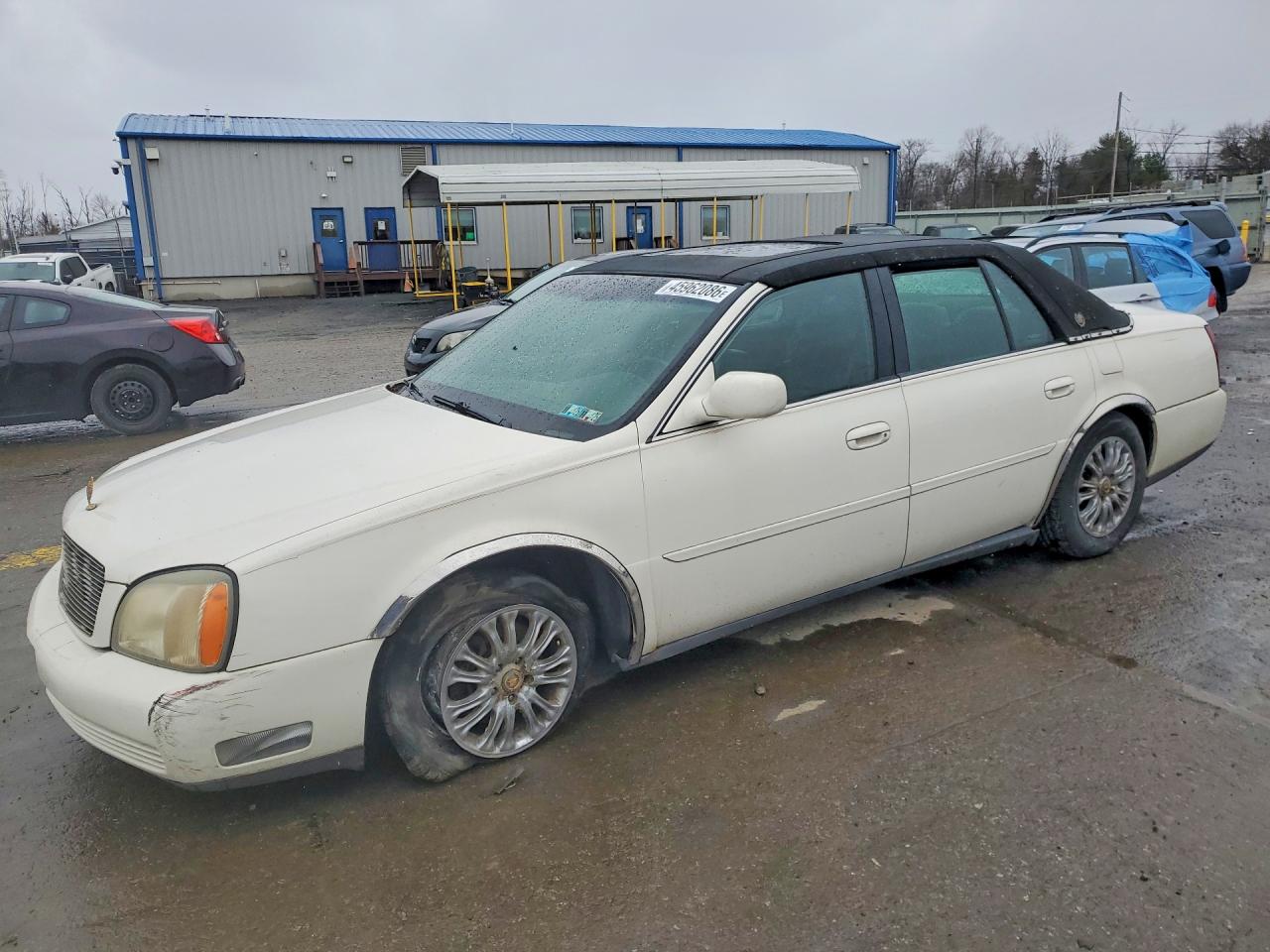 2001 Cadillac Deville VIN 1G6KD54YX1U143416 photo 1