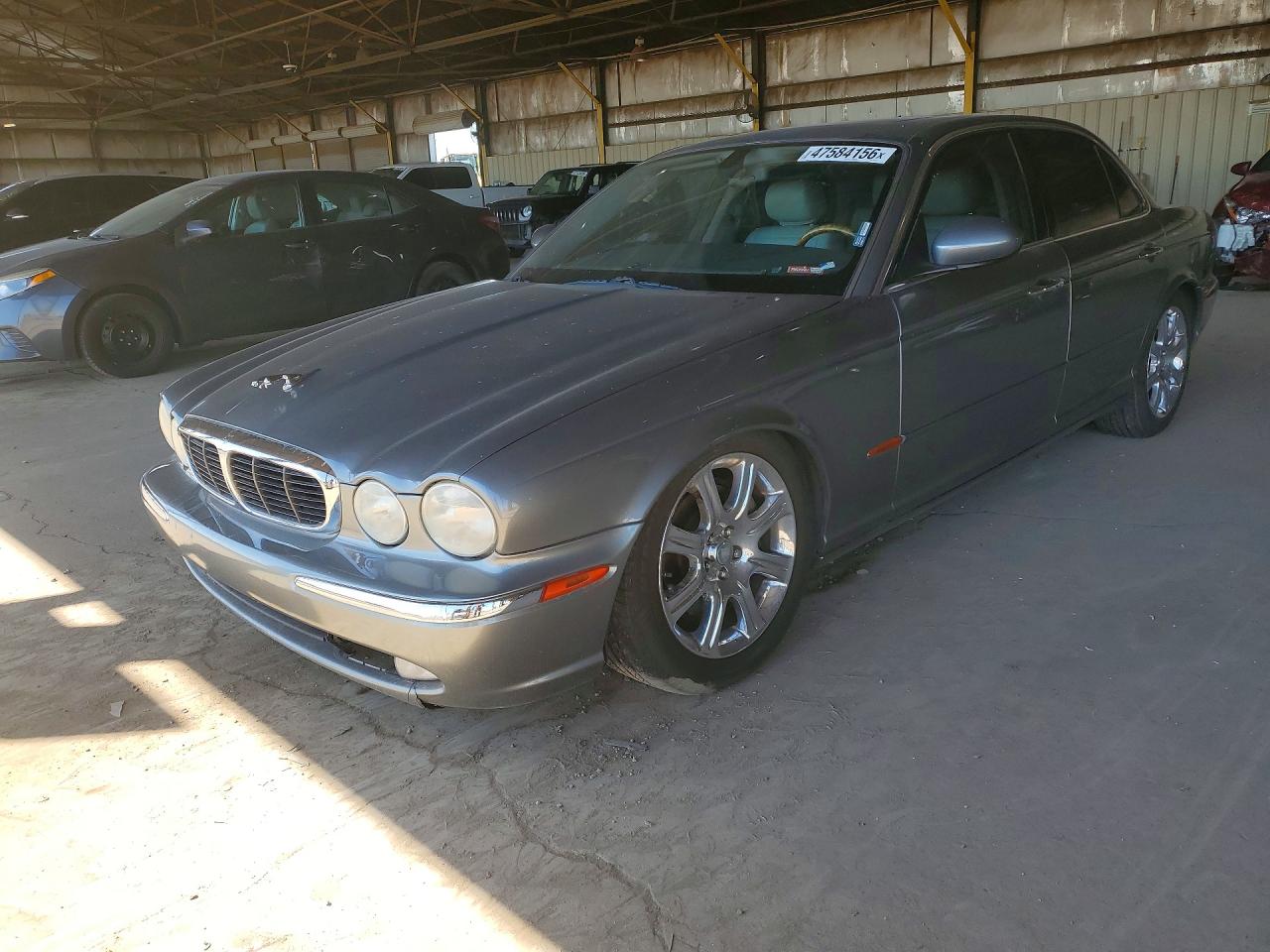 2004 Jaguar Xj8 VIN SAJWA71C04SG25165 photo 1