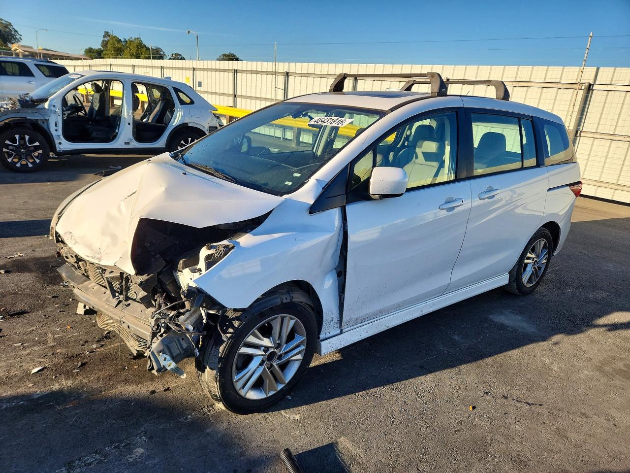 2011 Mazda 5 VIN JM1CW2DL1C0109003 photo 1