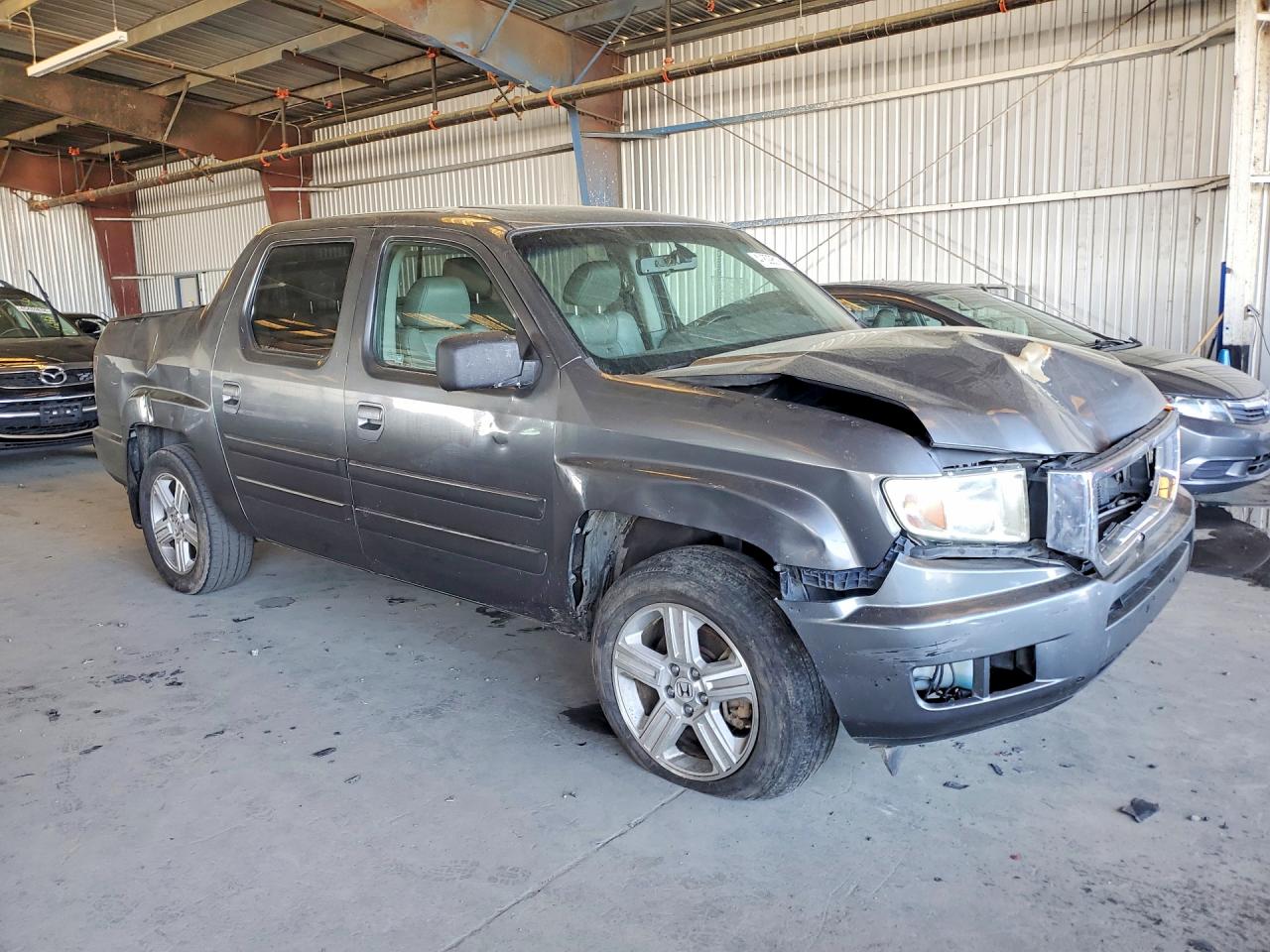2012 Honda Ridgeline VIN 5FPYK1F54CB001008 photo 4
