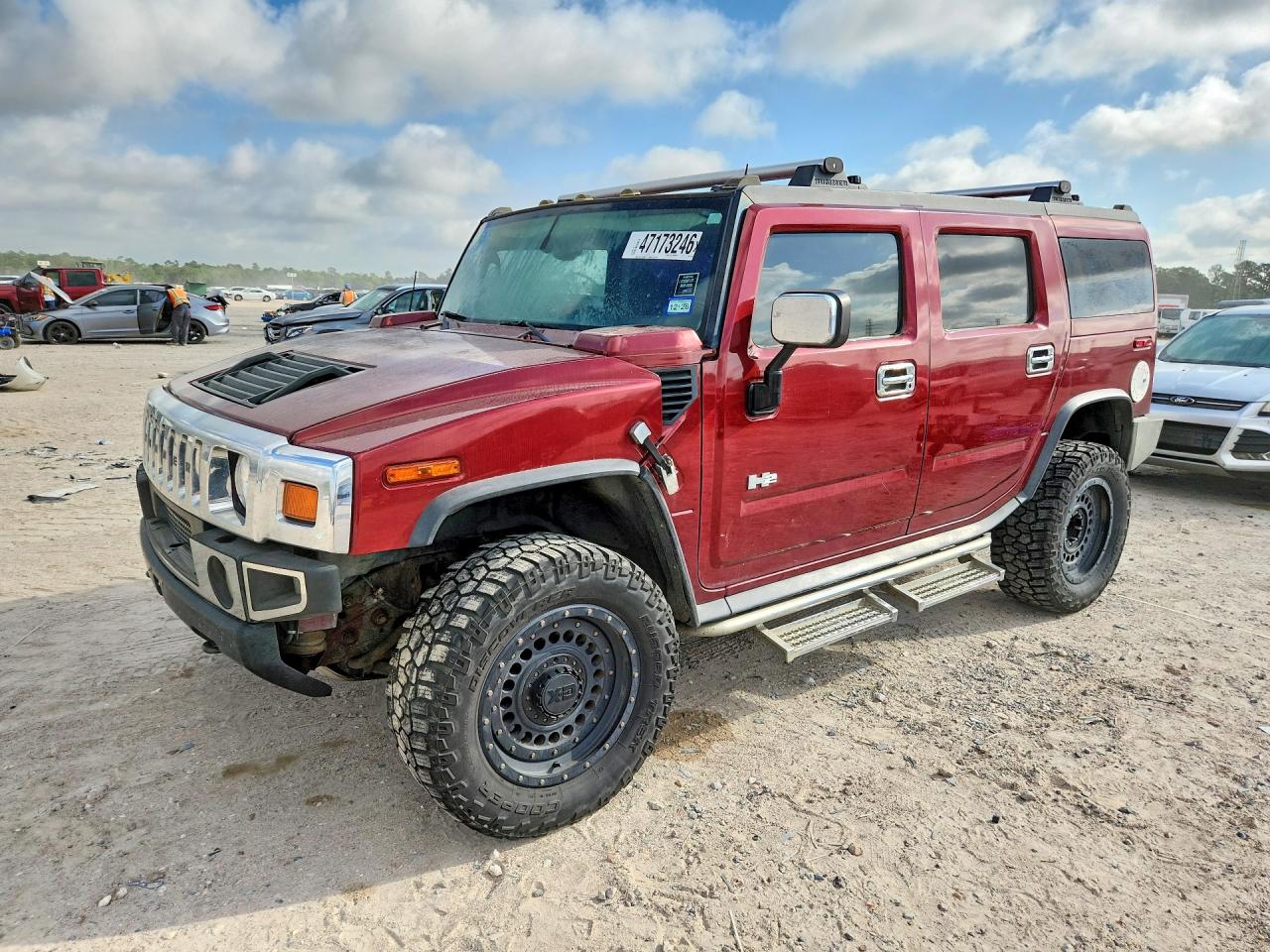 2004 Hummer H2 VIN 5GRGN23U64H104704 photo 1