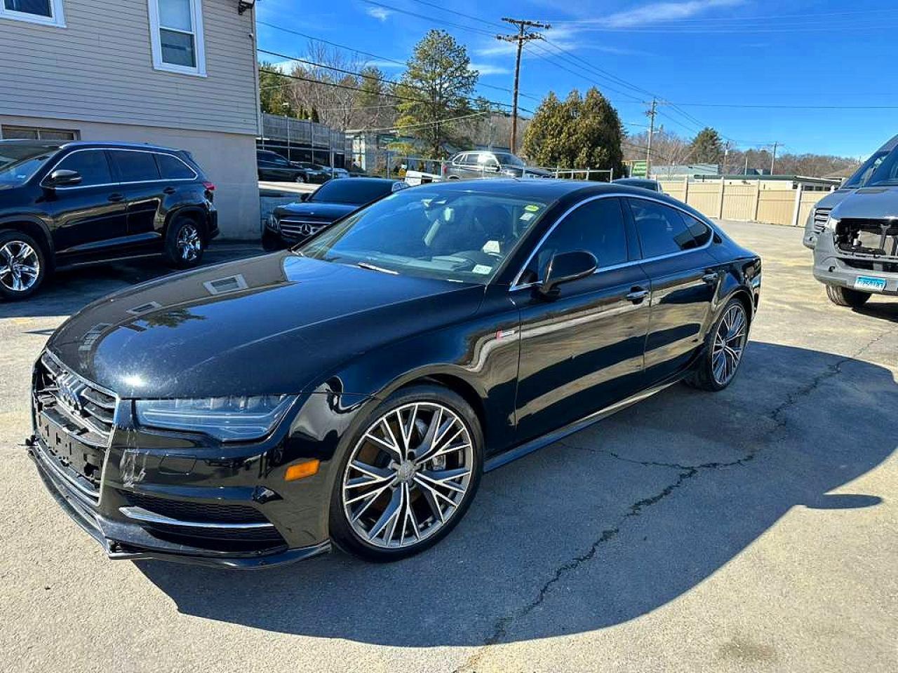2016 Audi A7 VIN WAU2GAFCXGN004725 photo 1