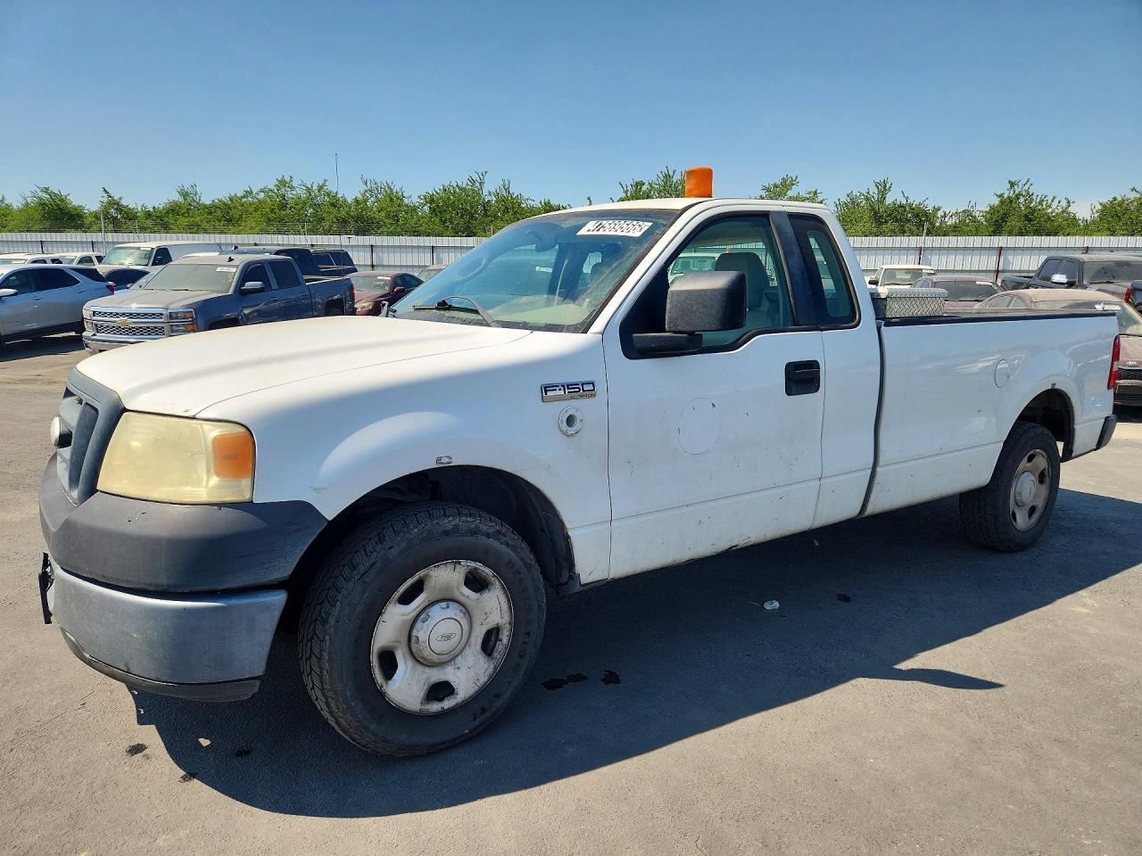 2007 Ford F150 VIN 1FTRF12W97KC85907 photo 1