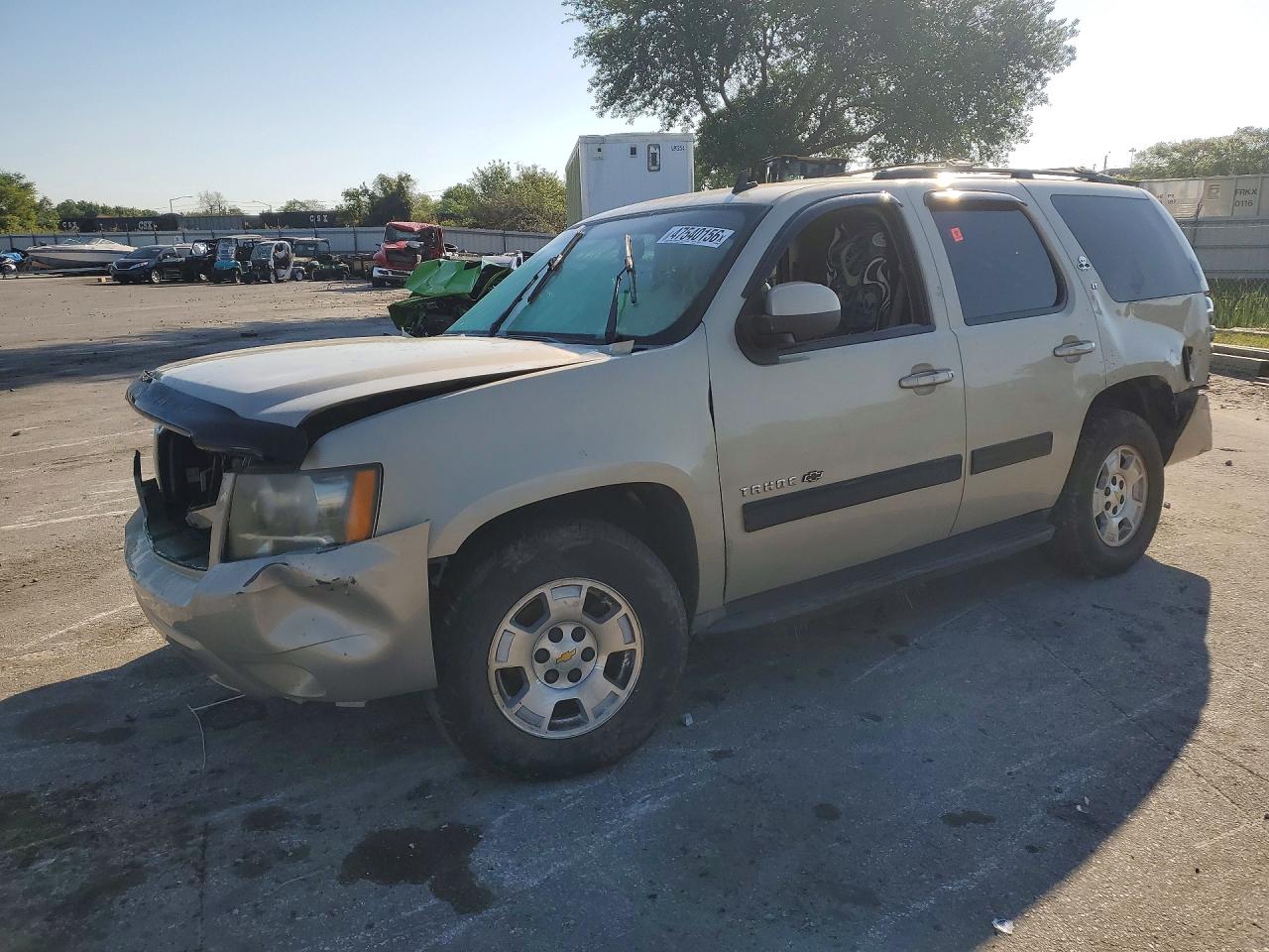 2012 Chevrolet Tahoe VIN 1GNSCBE06CR105802 photo 1