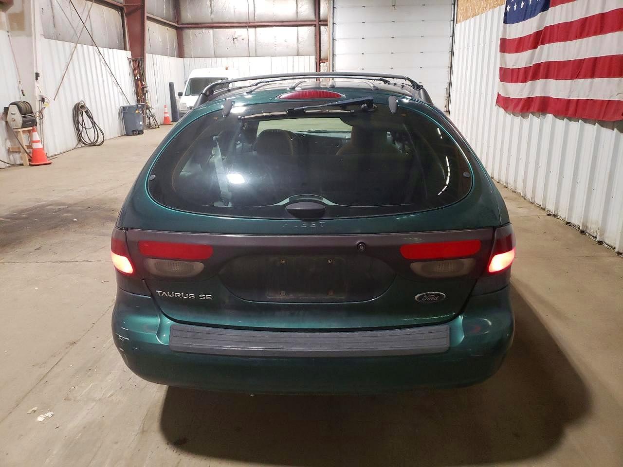 2000 Ford Taurus VIN 1FAFP5828YG225641 photo 6