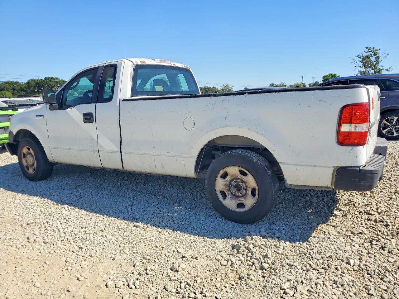 2007 Ford F150 VIN 1FTRF12207KA95510 photo 2