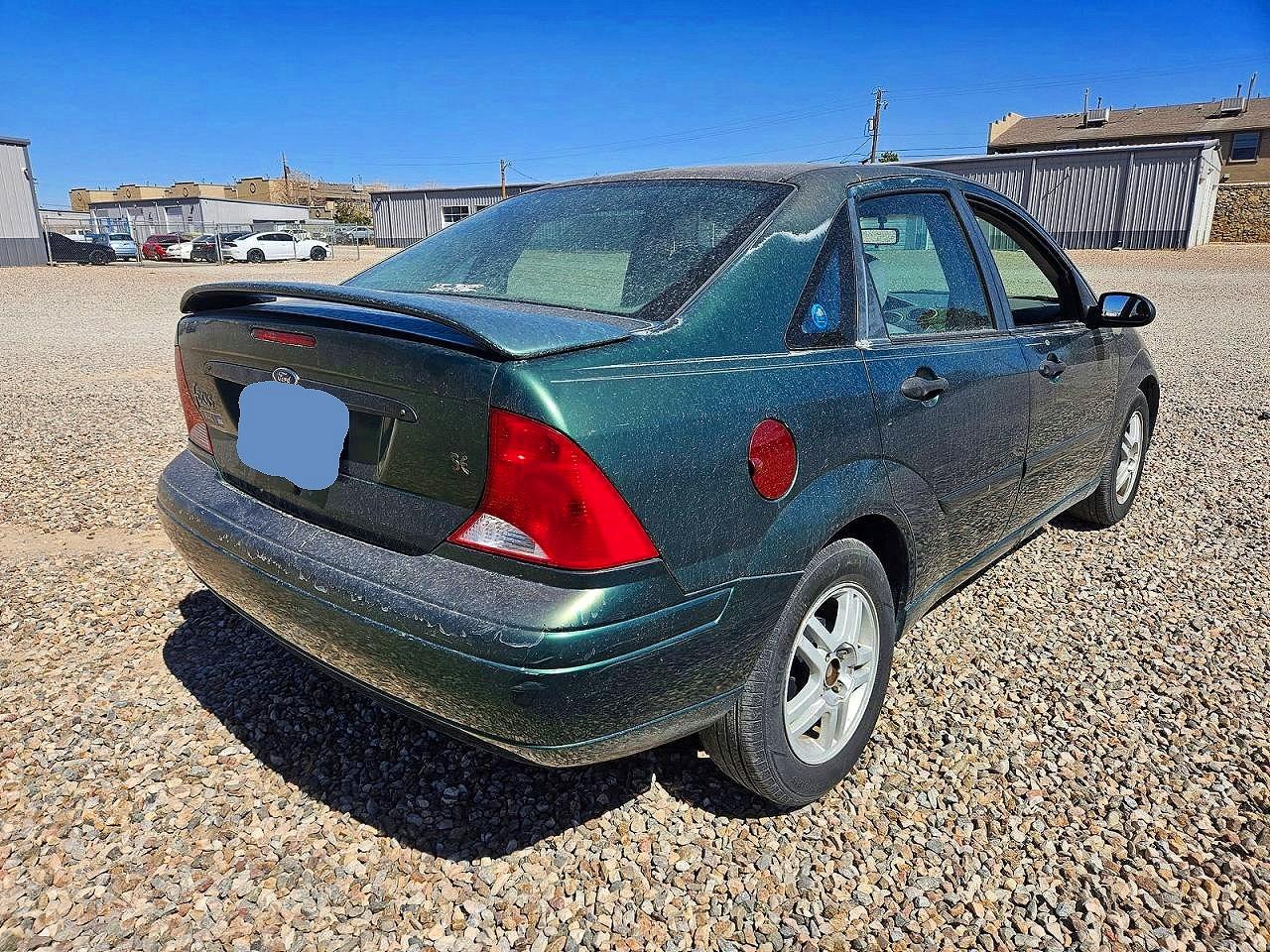 2000 Ford Focus VIN 1FAFP3433YW219500 photo 4