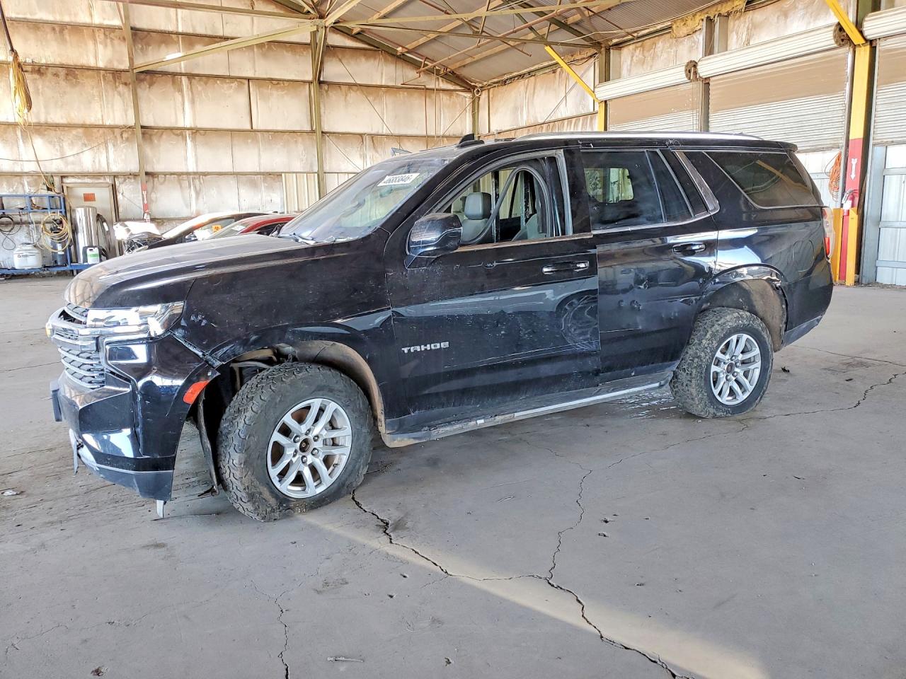 2021 Chevrolet Tahoe VIN 1GNSKNKD1MR360175 photo 1