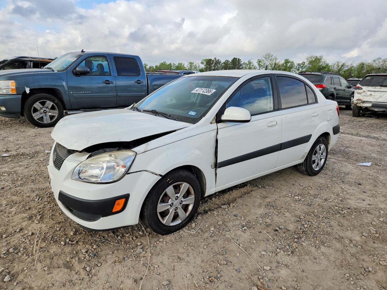 2009 Kia Rio VIN KNADE223596477004 photo 1