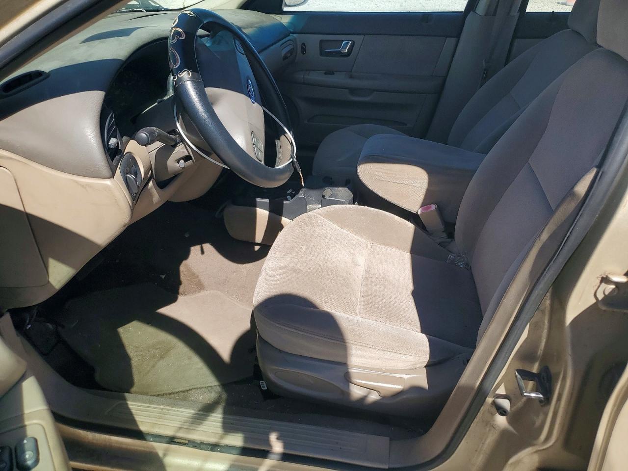 2000 Ford Taurus VIN 1FAFP5325YA255920 photo 7