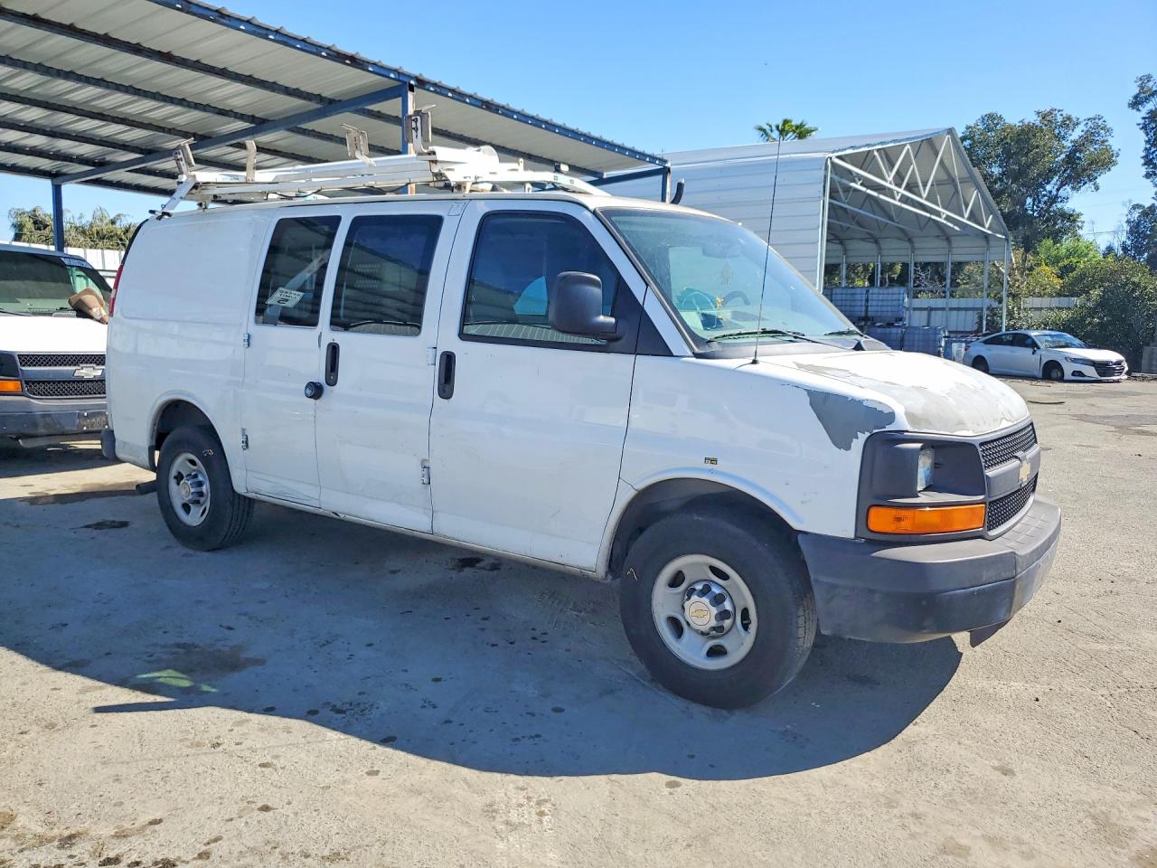 2012 CHEV Express VIN 1GCWGFCB9C1117807 photo 4