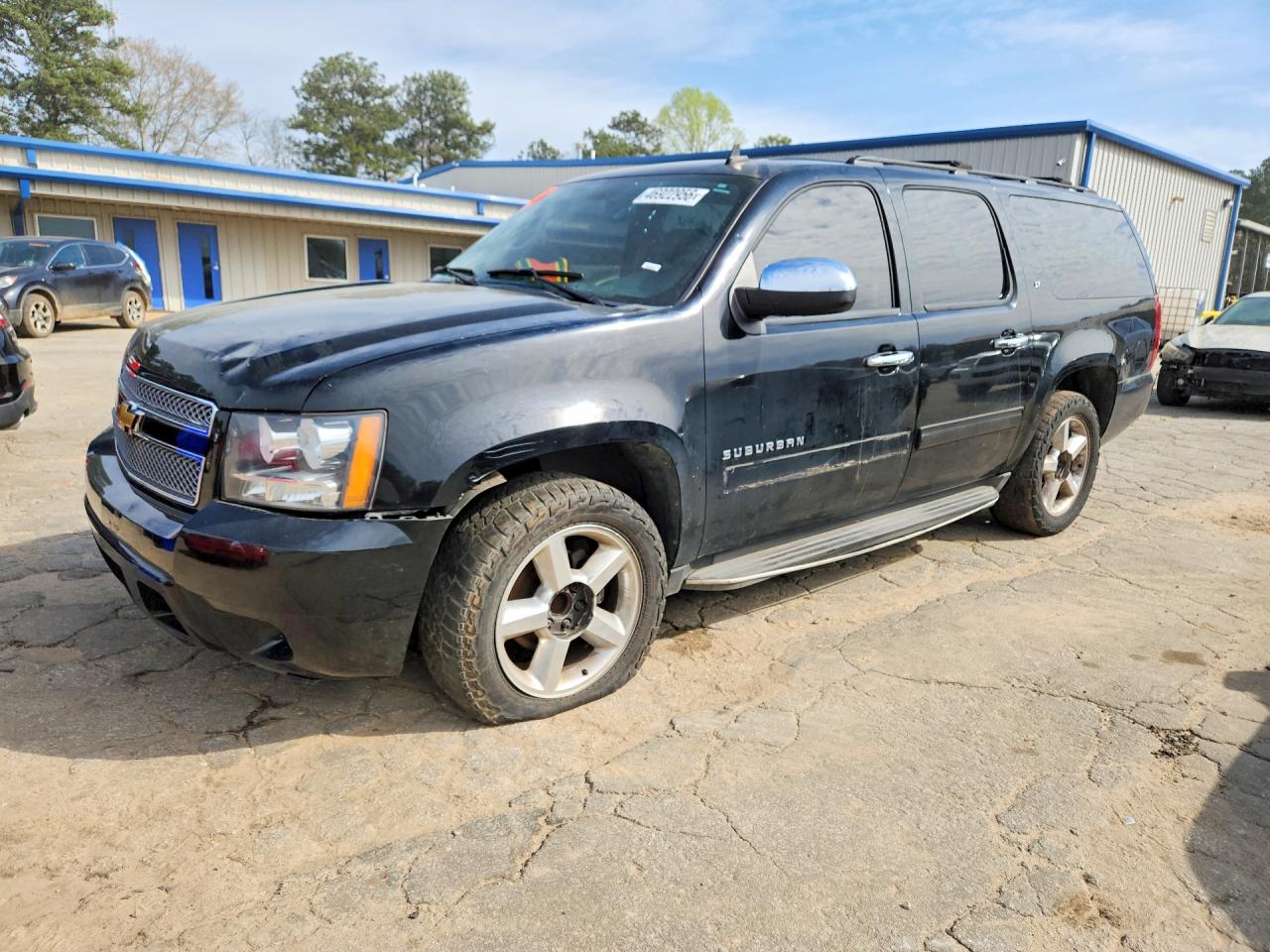 2013 Chevrolet Suburban VIN 1GNSCJE08DR120586 photo 1