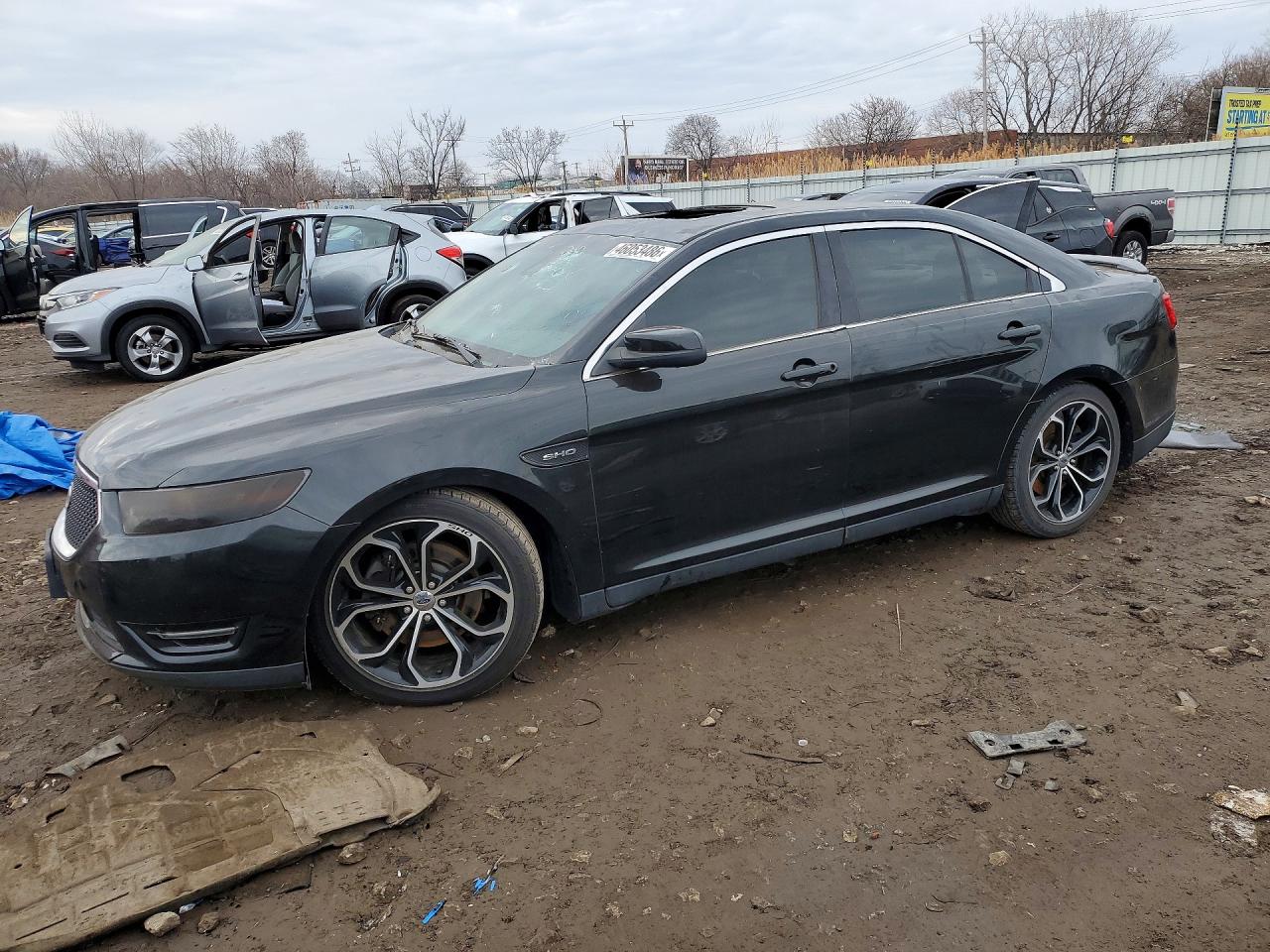 2014 Ford Taurus VIN 1FAHP2KT5EG128384 photo 1