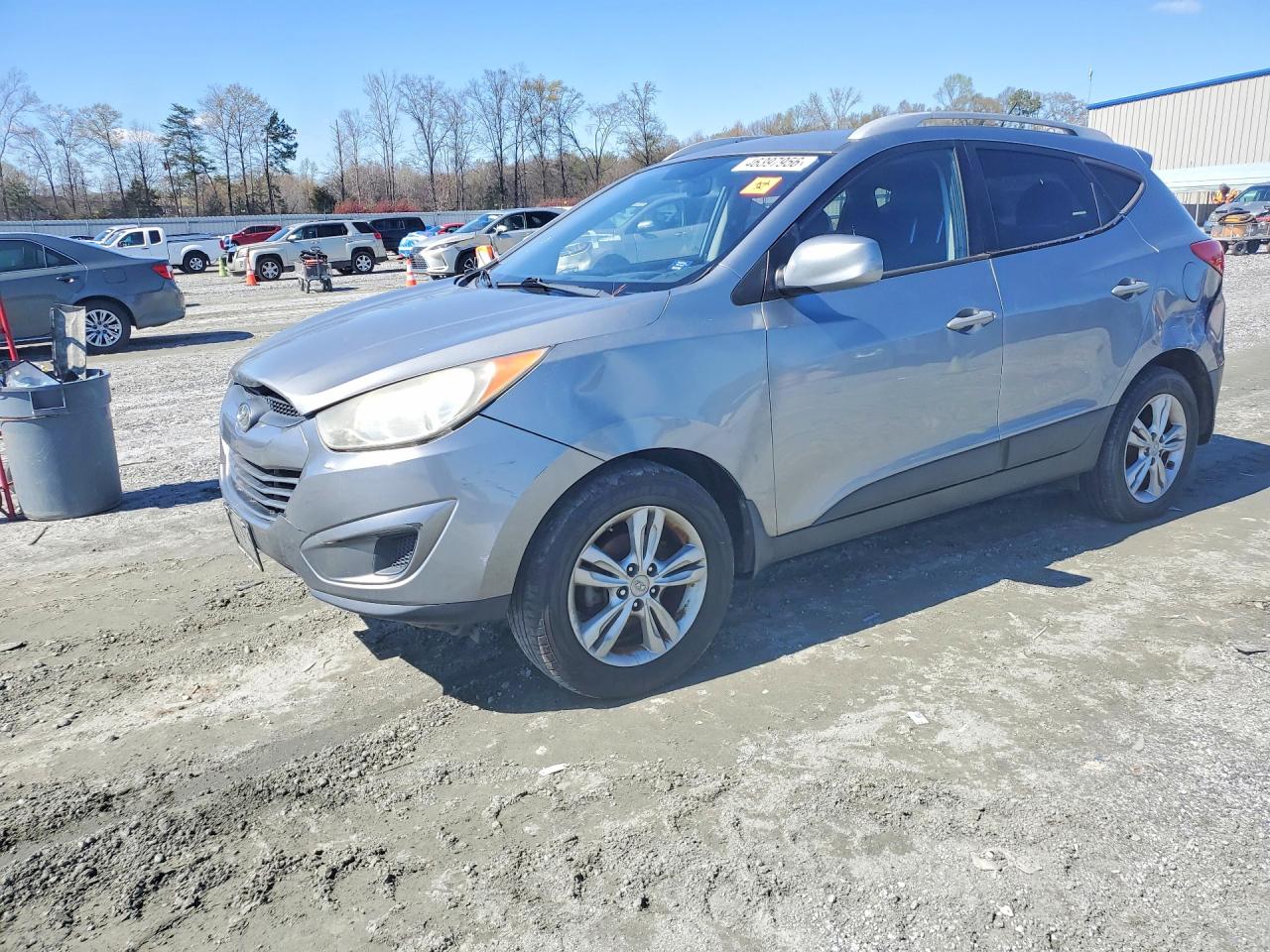 2010 Hyundai Tucson VIN KM8JU3AC3AU071041 photo 1