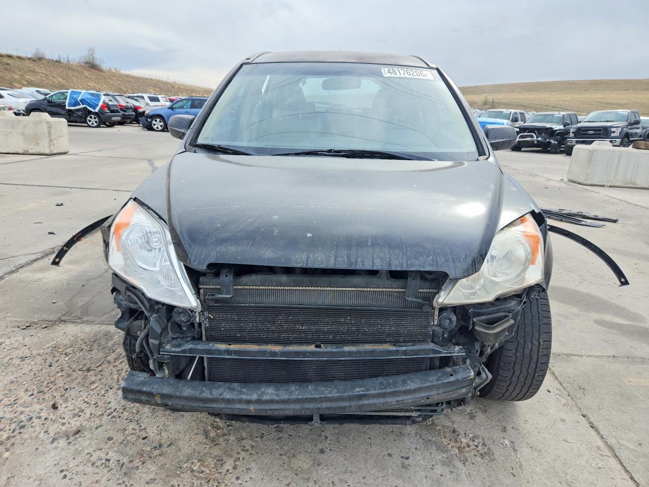 2009 Honda Crv VIN JHLRE48309C000657 photo 5