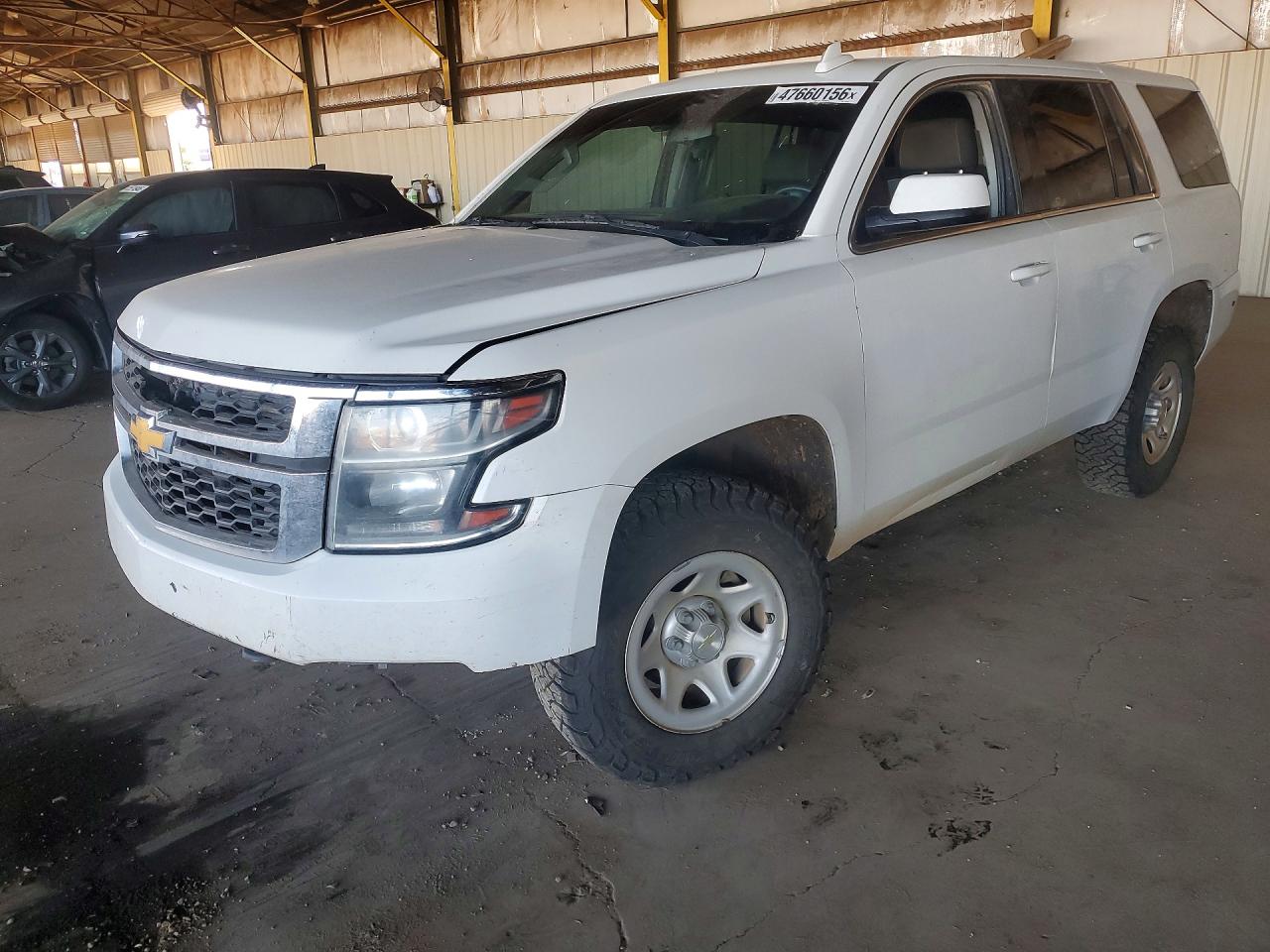 2019 Chevrolet Tahoe VIN 1GNSKFEC7KR128752 photo 1