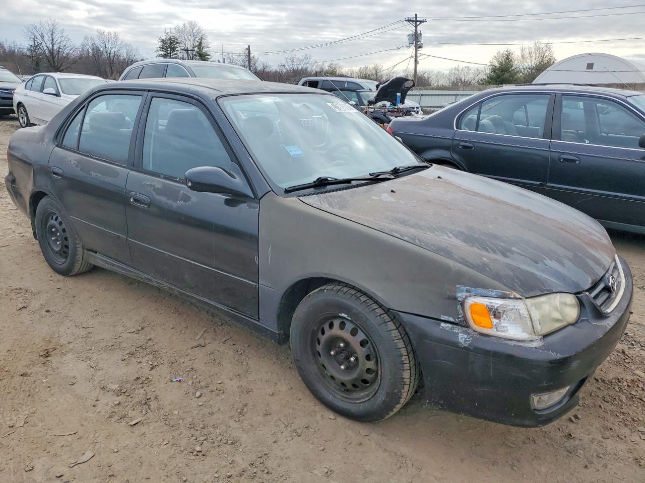 2001 Toyota Corolla VIN 1NXBR12E11Z490998 photo 4