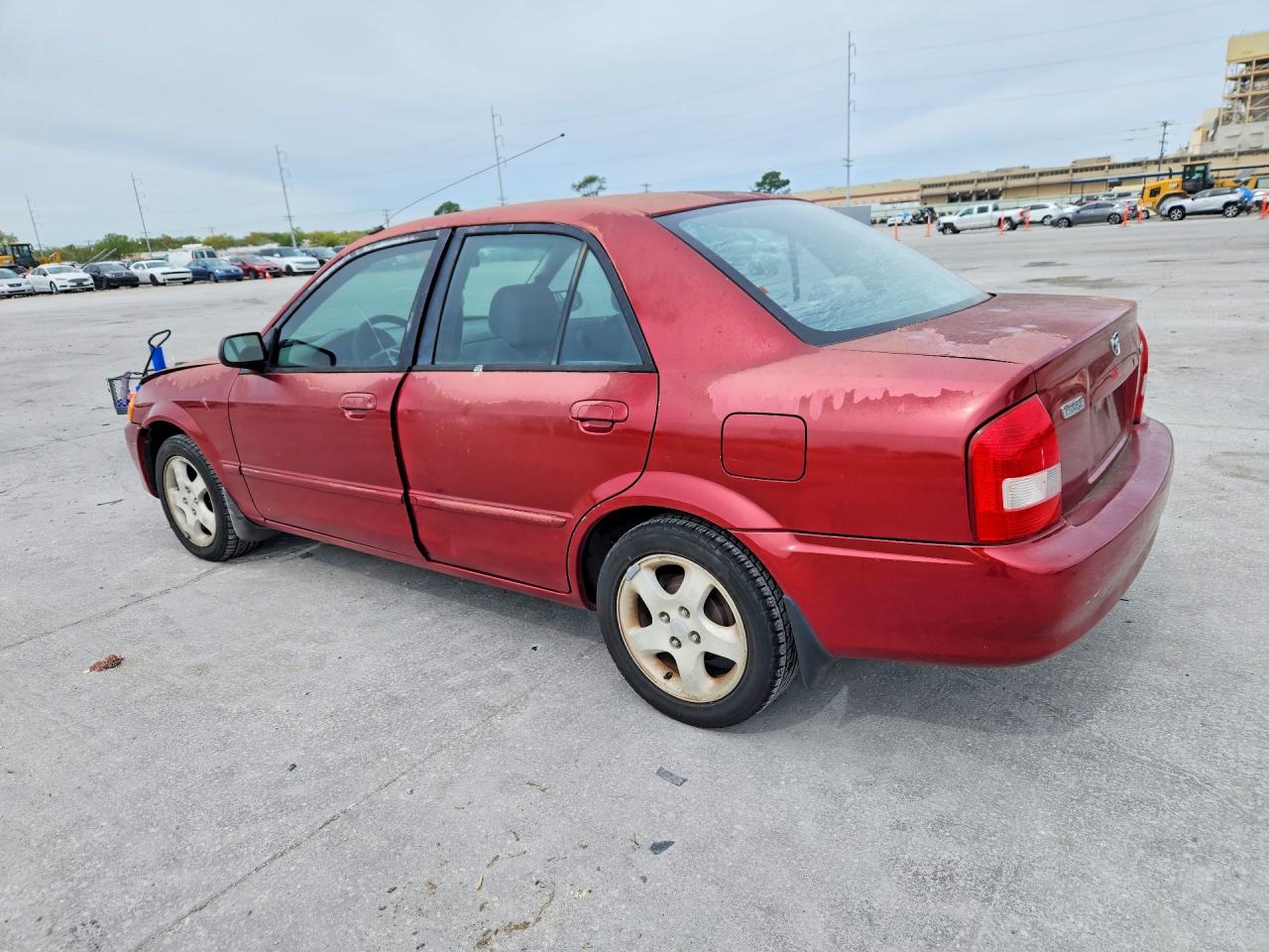 1999 Mazda Protege VIN JM1BJ2216X0183504 photo 2