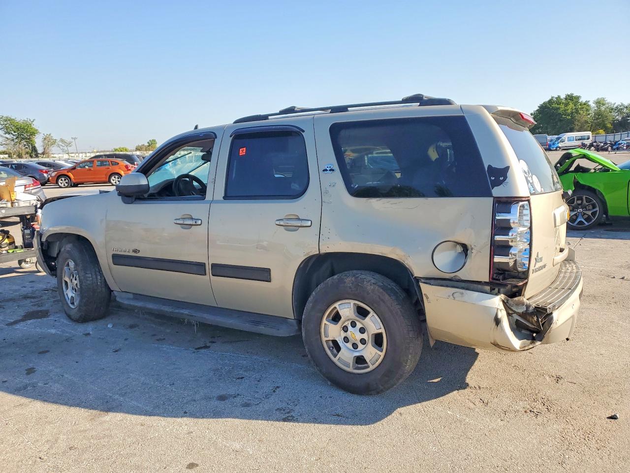 2012 Chevrolet Tahoe VIN 1GNSCBE06CR105802 photo 2