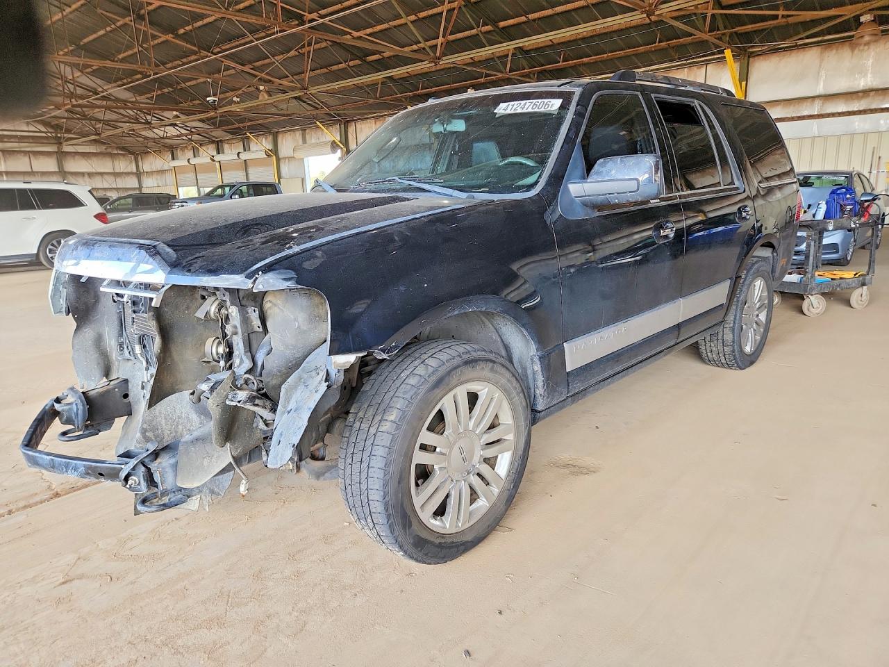 2010 Lincoln Navigator VIN 5LMJJ2H51AEJ09433 photo 1